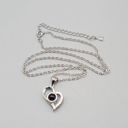 Collar con proyección "Te amo" en 100 idiomas